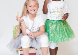 sitting and standing girls with tutus and inbybaby lip balm